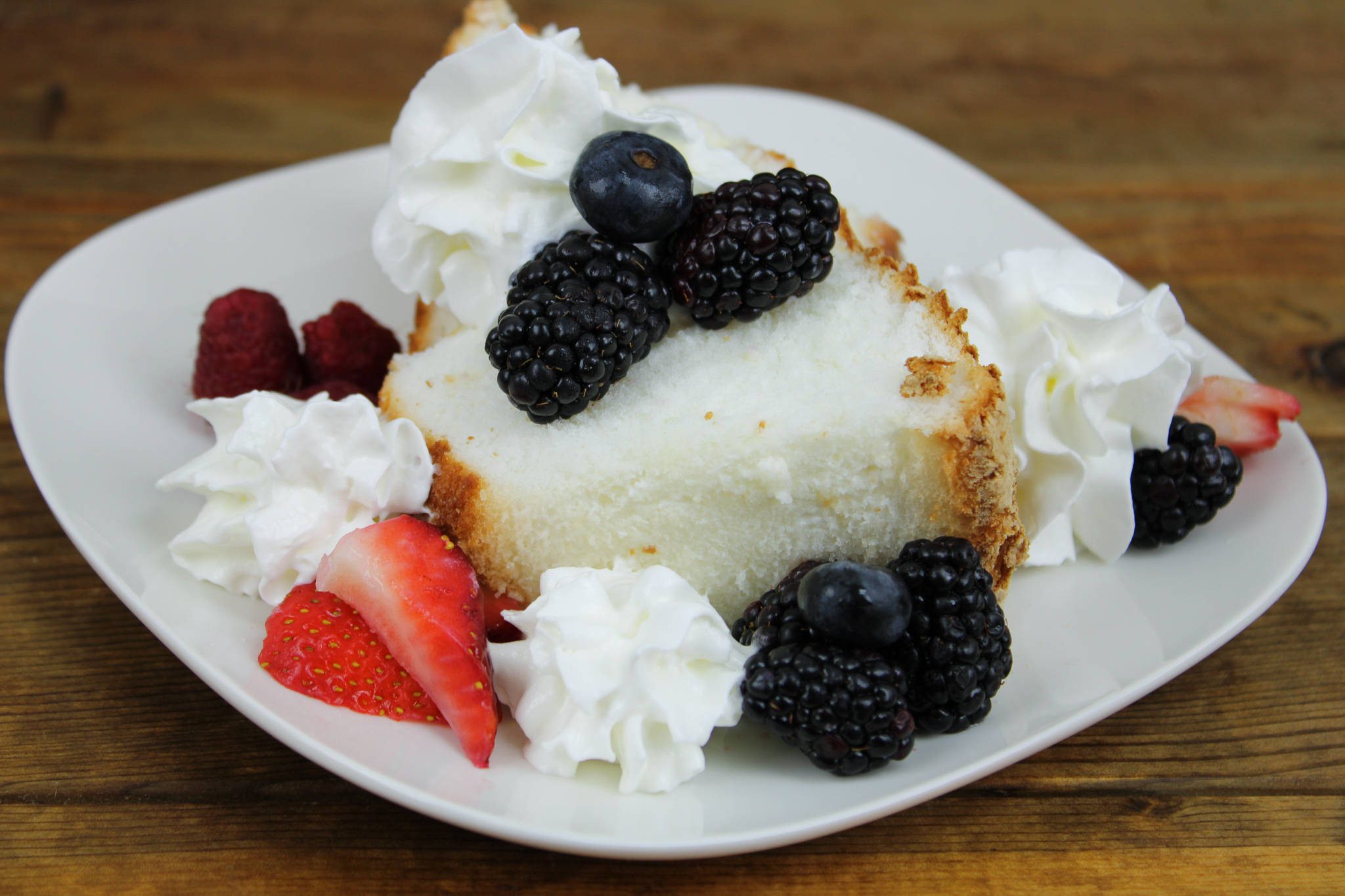 Angel Food Cake with Fresh Fruit Topping and Whipped Cream
